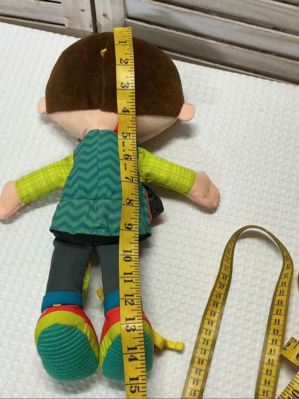Plush Activity Boy Doll in Green and Yellow - Interactive Learning Toy